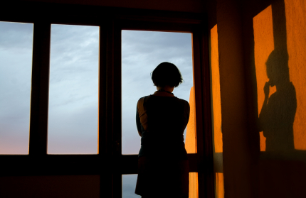 A Lady Casting a Shadow on the Wall